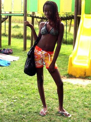 Ebony nubile hotties posing for