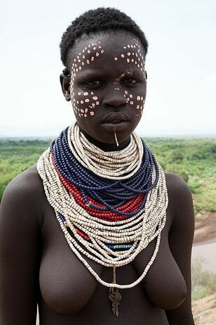 Bare-chested african nymphs..