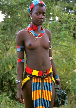 Bare-breasted african gals baring..