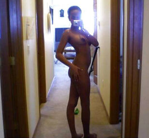 Ebony dame posing nude, kinky and